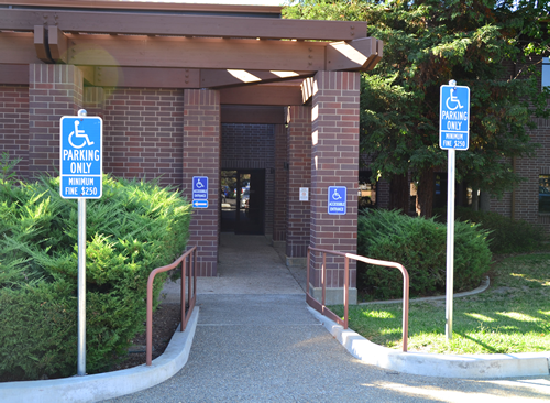 image of handicap access signs at a county building