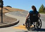 image of a girl using a wheelchair 