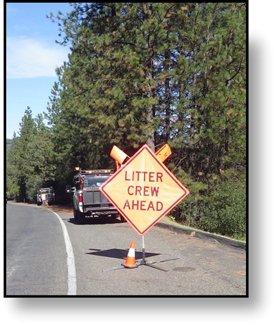 image of road crew ahead sign